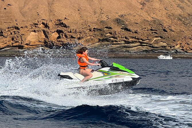 1 Person Turbo Jet Ski ride in Tenerife South with Pick Up - Swim Or Snorkel Stops: When The Tour Slows Down