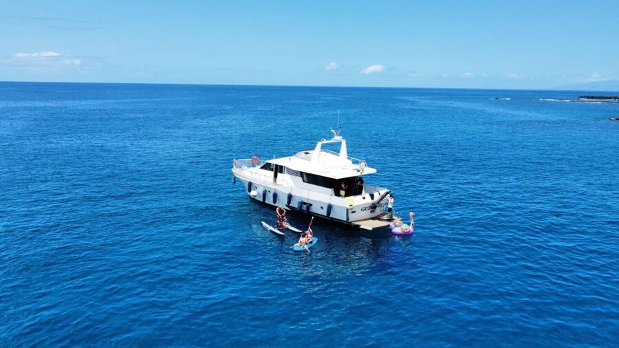 Costa Adeje: Private Yacht Trip with Watersports and Slides - Los Cristianos break: a calm moment before the water play