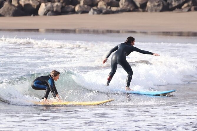 Group Surf Class in Playa de Las Américas with Photographs - Safety Rules, Water Conditions, and Your First Standing Attempts