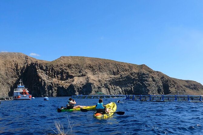Guided Kayak Tour From Los Cristianos Beach Tenerife - Snorkeling stops in guide-marked areas, and how to make them easier