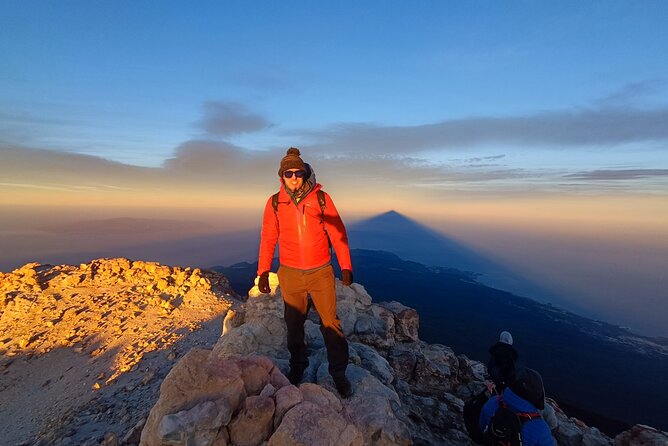 Night Hike to Summit of Teide for Sunrise and the Volcano Shadow - Teide’s sunrise moment: the triangle shadow and the sea of clouds