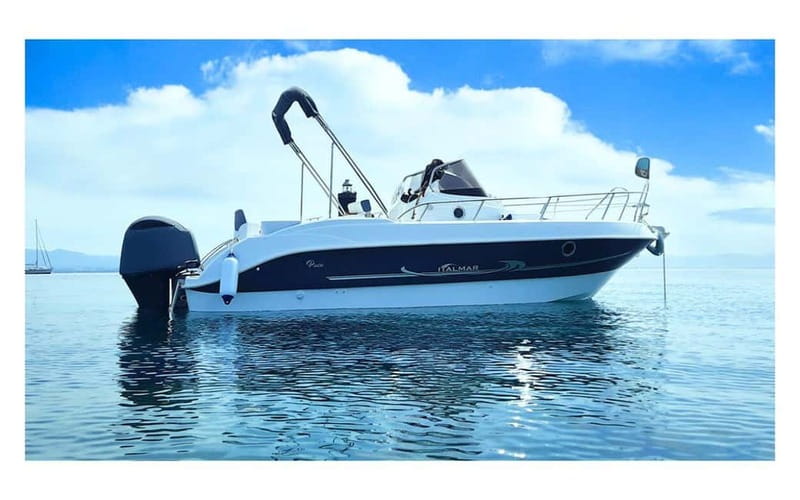 Puerto Colon: License-Free Self-Drive Boat in Tenerife - The boat setup: GPS, canopy shade, fridge, and Bluetooth music