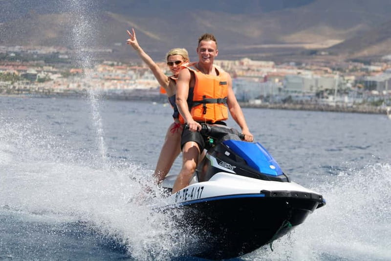 Puerto Colón: Tenerife Coast Jet Ski Tour with Photos - Wildlife and sunset energy, including a dolphins sighting