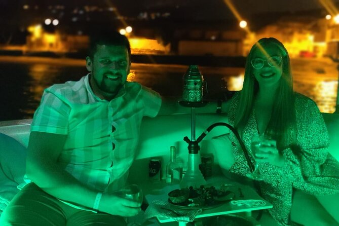 Romantic night ocean boat trip for 2 - The anchor stop in La Caleta lagoon: champagne, snacks, and a little magic