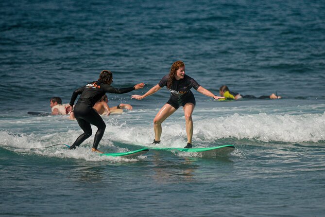 small group surf lesson in Playa de las Américas,Tenerife - Low-Tide Surf Coaching: How Beginners Get Real Feedback Fast