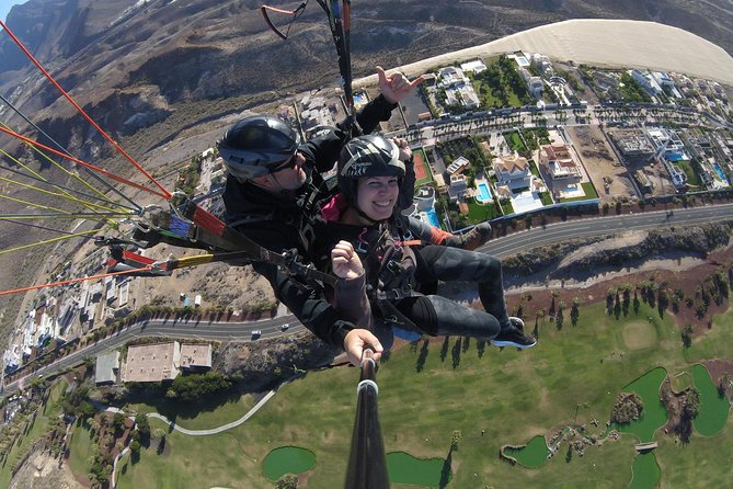 Tandem Paragliding Flight over Tenerife - Landing back on the ground, then returning to south Tenerife