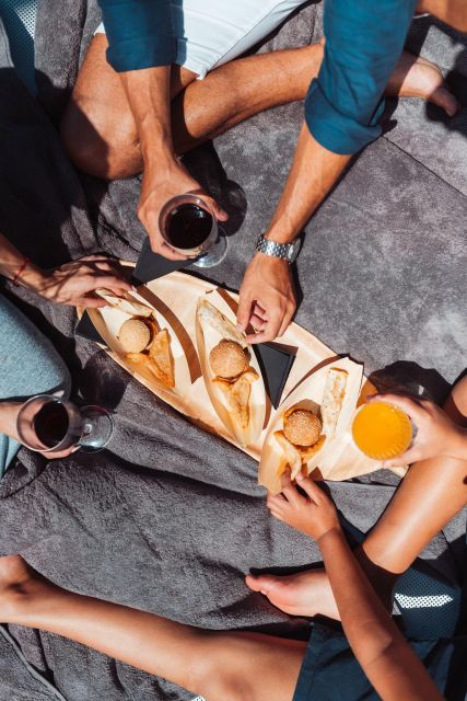 Tenerife: Catamaran Cruise with Brunch and Unlimited Drinks - Wildlife spotting at Punta Rasca: dolphins, pilot whales, and flying fish