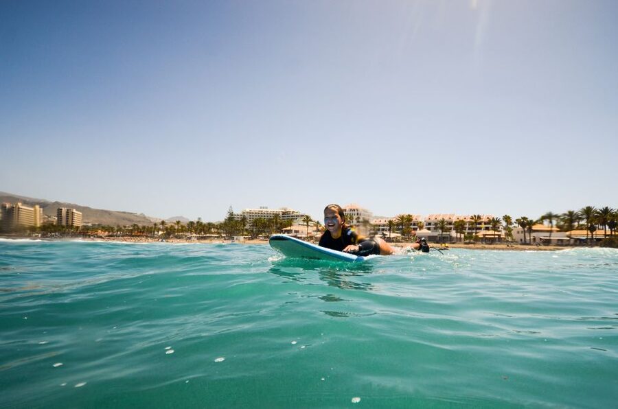 Tenerife: Surf Lesson at Playa de Las Americas - Surf lesson flow: learn basics, then go for your first stand-up wave